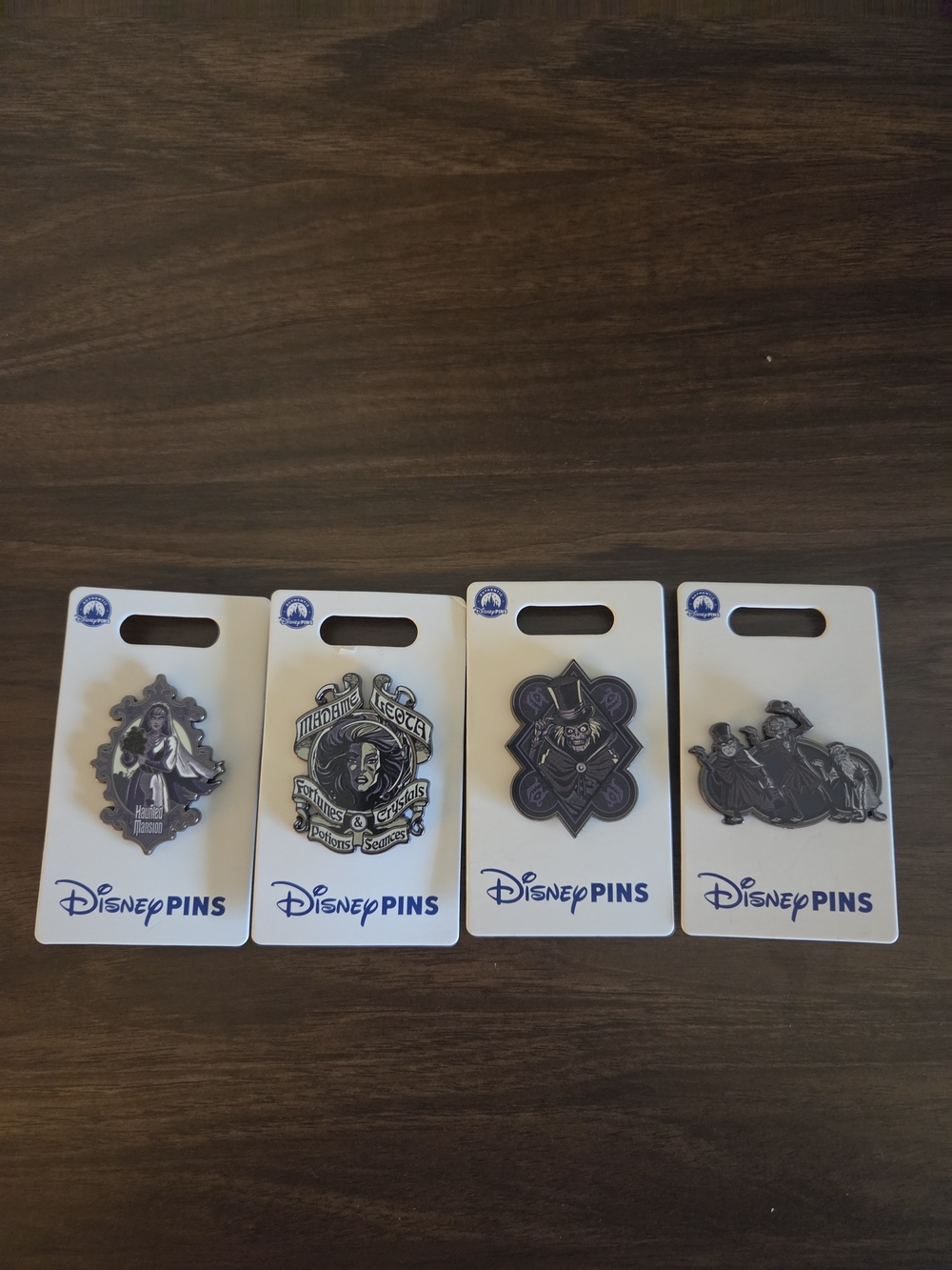 2025 Disney Parks Haunted Mansion 4 Pin Set Hatbox, Hitchhiking Ghost, Leota NEW